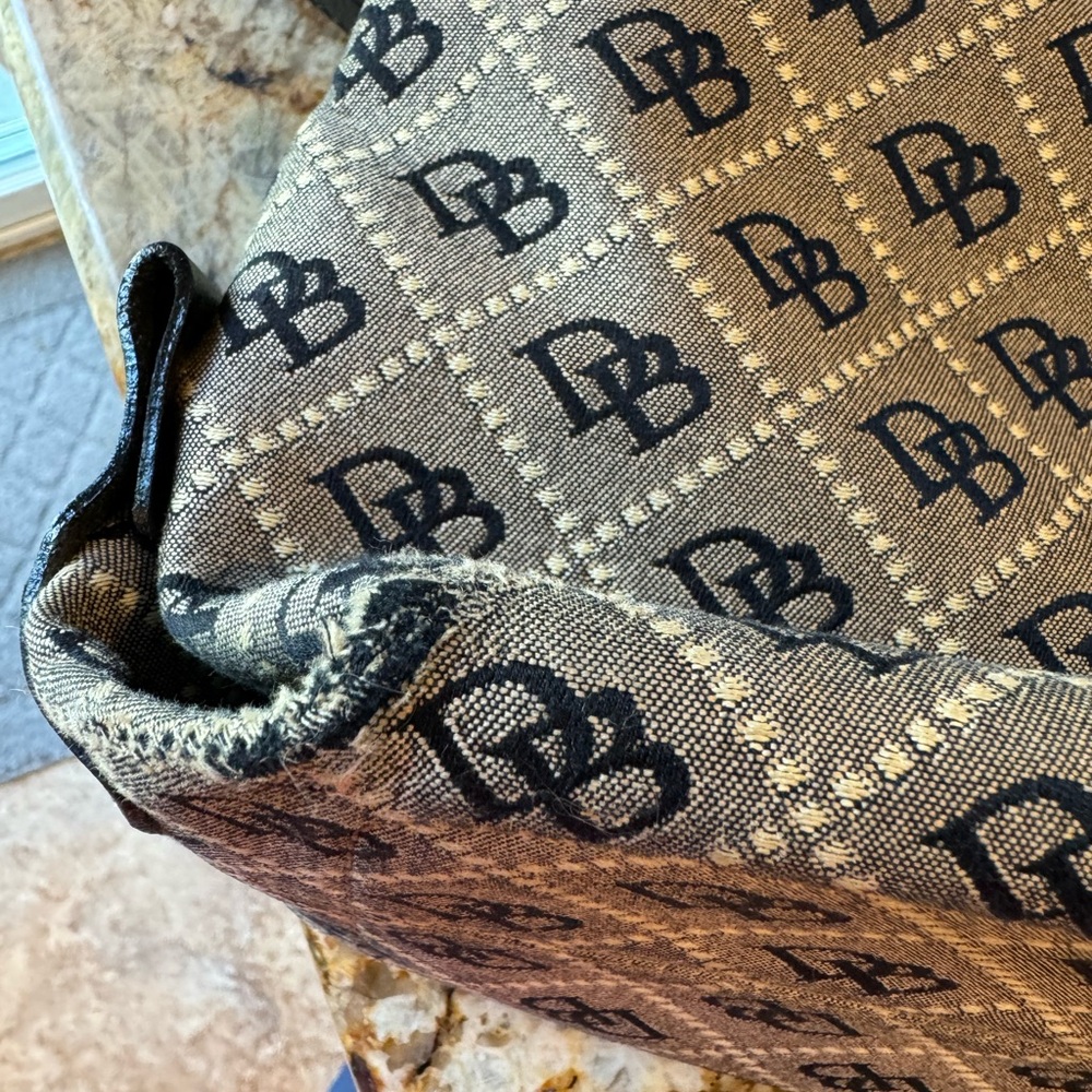 Dooney and Bourke cloth and leather square shoulder purse. - Picture 9 of 16